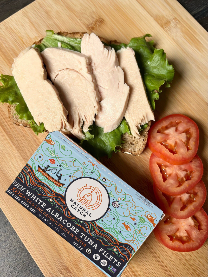 Natural Catch White Albacore tuna sandwich with tomatoes and updated Albacore Water packaging